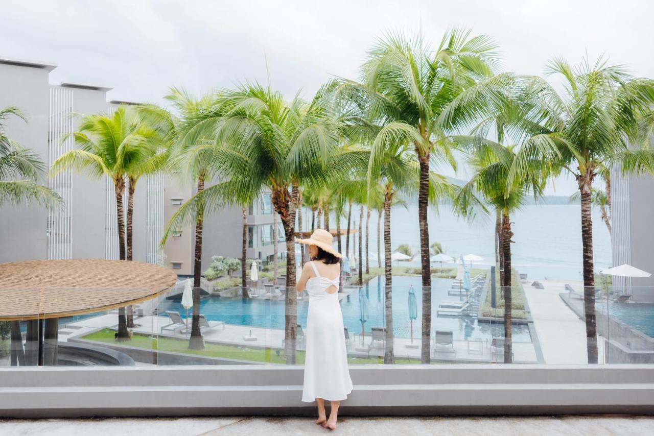Oceanfront Beach Resort - Sha Extra Plus Patong Bagian luar foto View of the pool at the hotel
