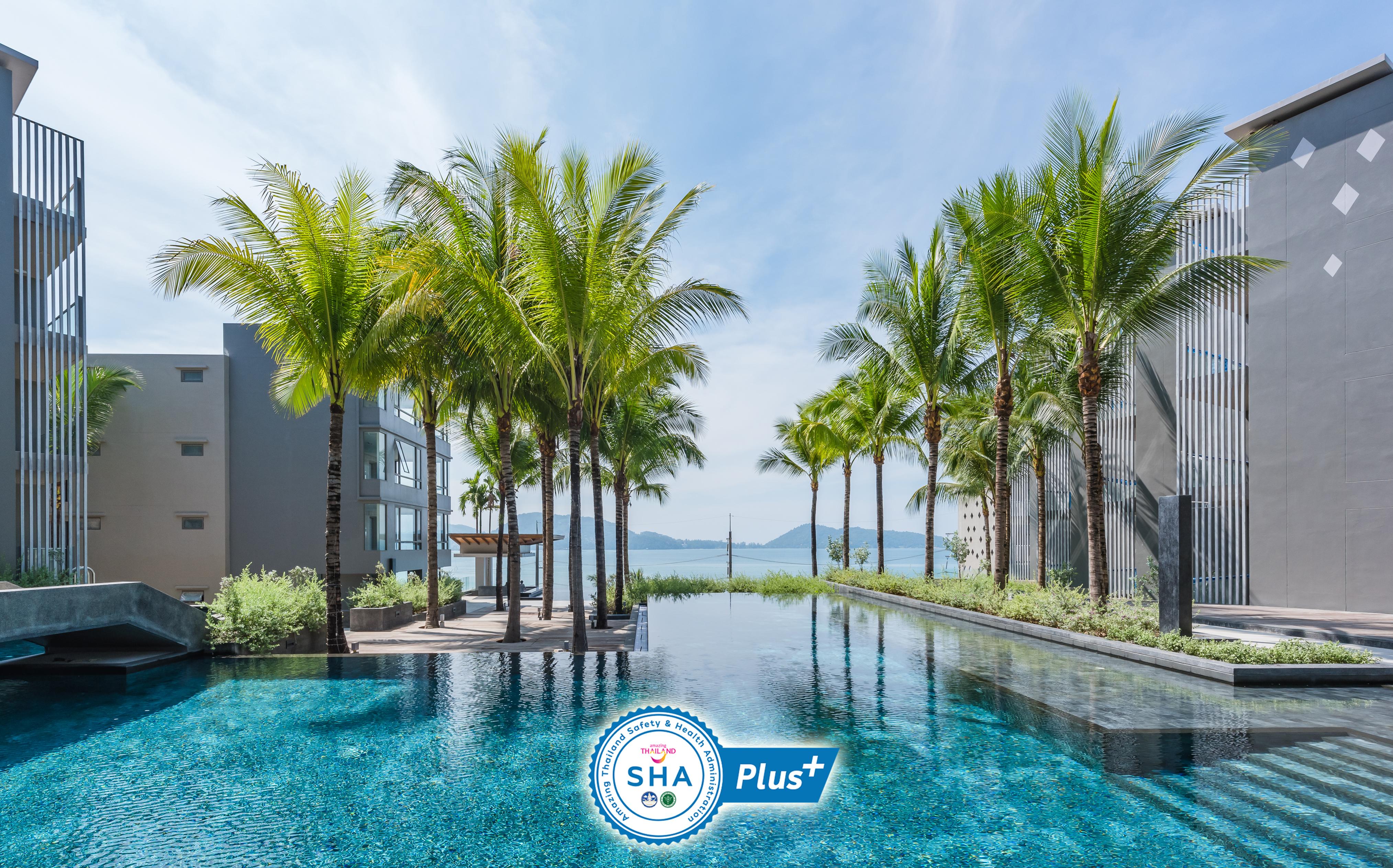 Oceanfront Beach Resort - Sha Extra Plus Patong Bagian luar foto The SHA Plus logo