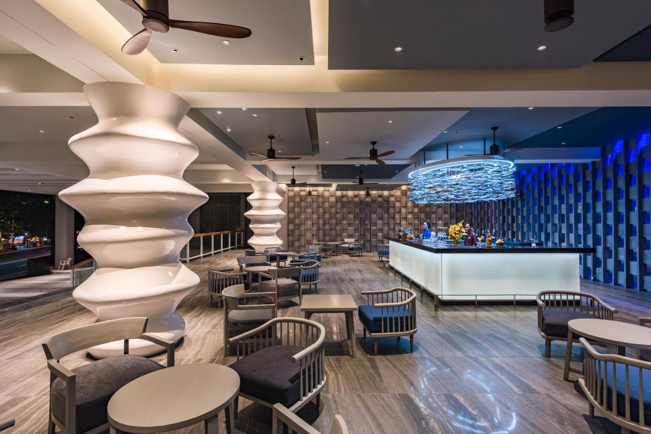 Oceanfront Beach Resort - Sha Extra Plus Patong Bagian luar foto The lounge at the airport