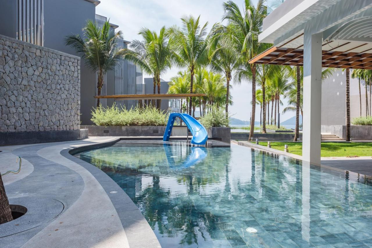 Oceanfront Beach Resort - Sha Extra Plus Patong Bagian luar foto The swimming pool at the resort