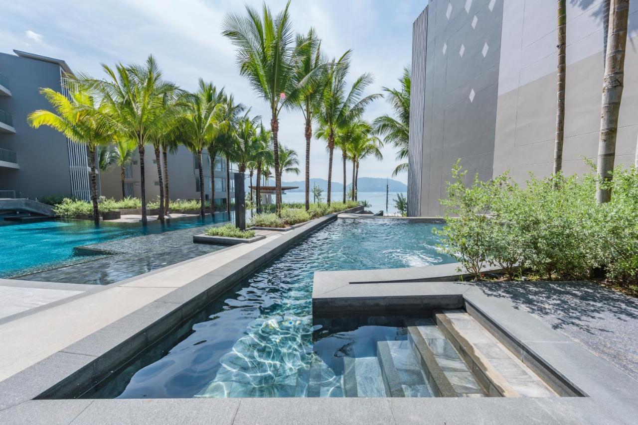 Oceanfront Beach Resort - Sha Extra Plus Patong Bagian luar foto The Cove Pool