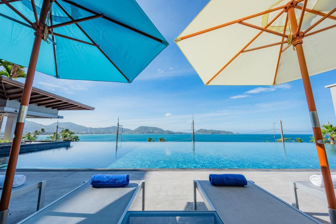 Oceanfront Beach Resort - Sha Extra Plus Patong Bagian luar foto View from the pool at the resort