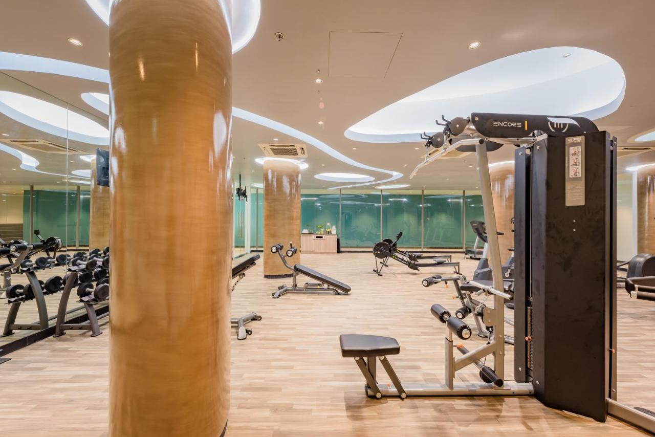Oceanfront Beach Resort - Sha Extra Plus Patong Bagian luar foto The gym at the hotel